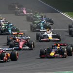 Ferrari's British driver Lewis Hamilton (front L) leads the pack at the start of the sprint race of the Formula One Chinese Grand Prix at the Shanghai International Circuit in Shanghai on March 22, 2025. (Photo by Greg Baker / AFP)